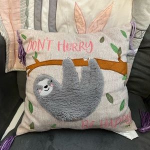 “Don’t worry be happy” sloth pillow